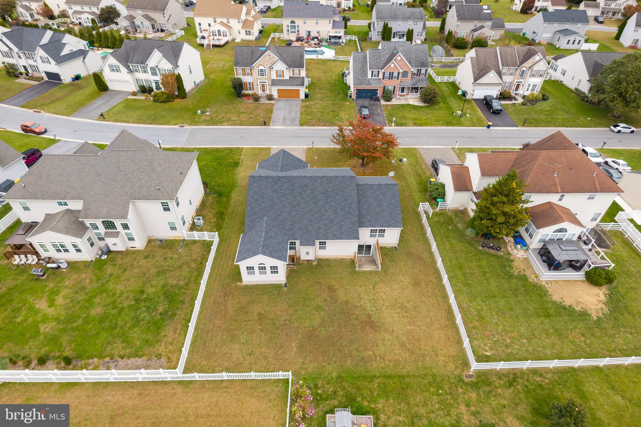 97 Needham Drive Smyrna, DE 19977 - Photo 49 of 52 an aerial view of residential houses with outdoor space and swimming pool