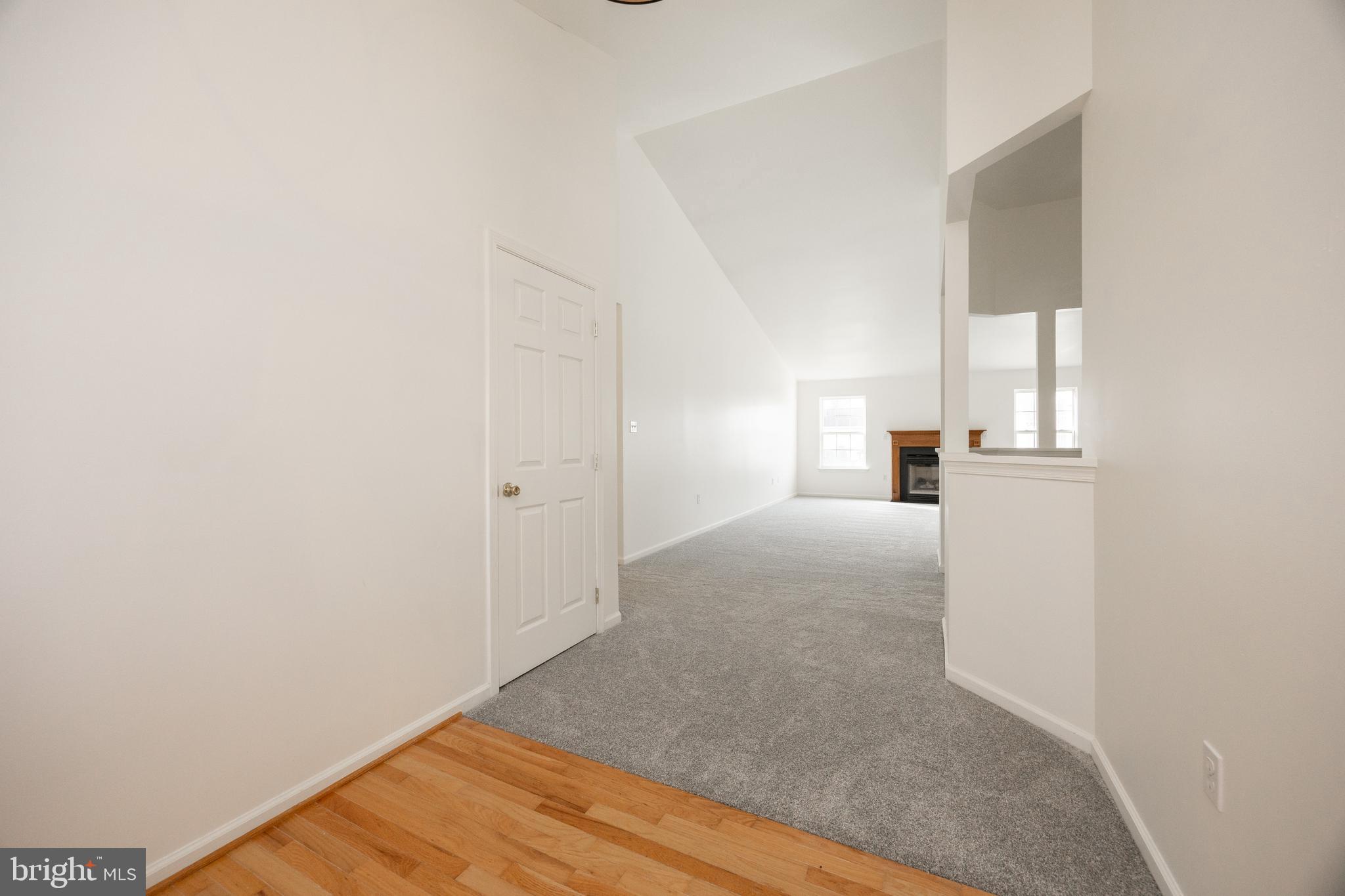 97 Needham Drive Smyrna, DE 19977 - Photo 6 of 52 a view of empty room with wooden floor