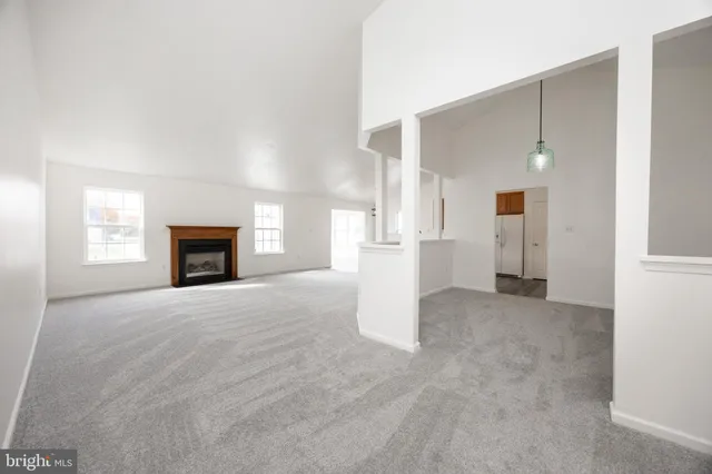 a view of a kitchen with furniture and a kitchen