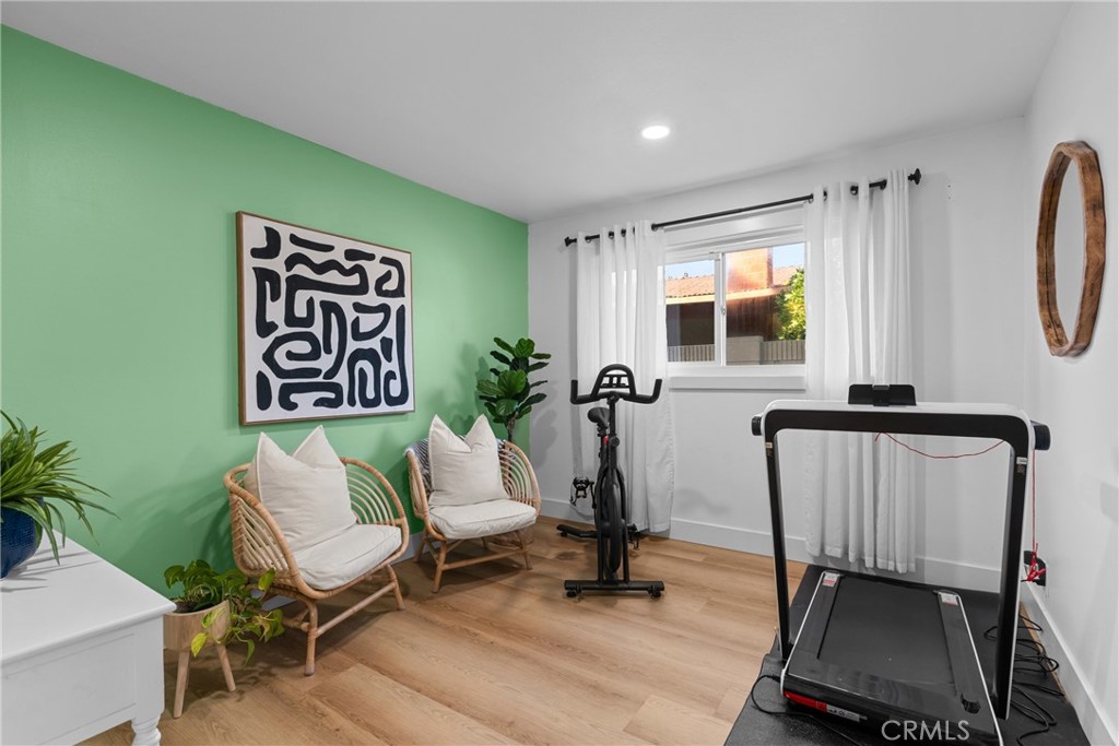 225 South Feldner Road Orange, CA 92868 - Photo 19 of 40 a living room with furniture and a large window