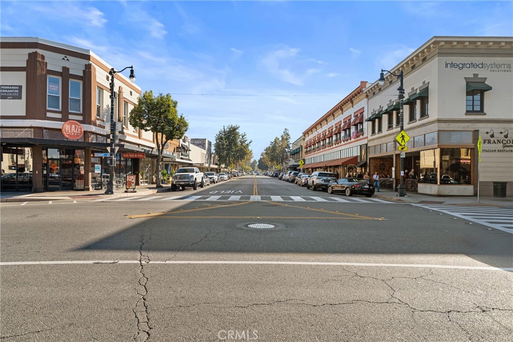 225 South Feldner Road Orange, CA 92868 - Photo 33 of 40 a street with a building and a street sign