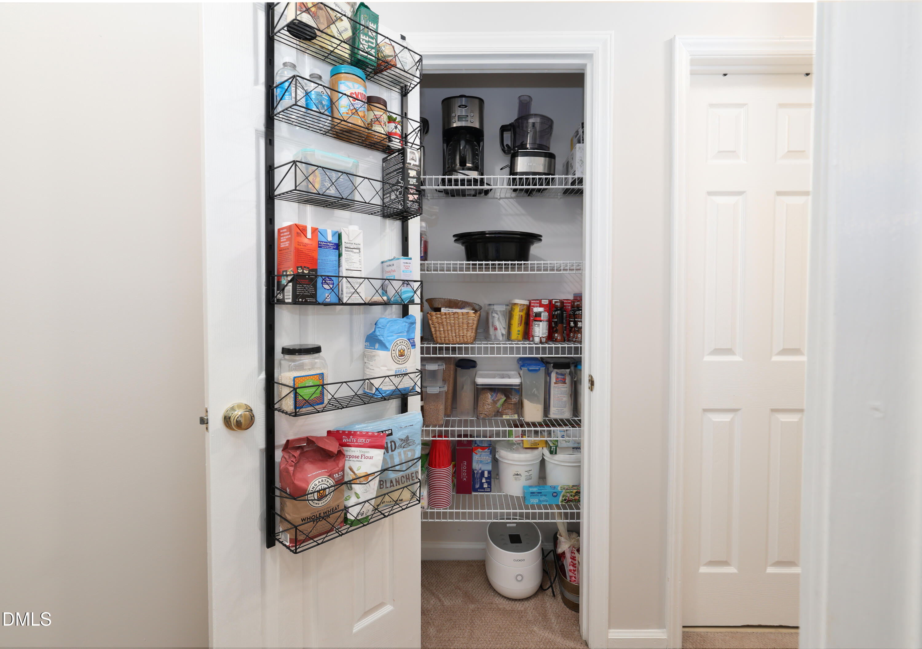 3011 Elk Ridge Road Durham, NC 27712 - Photo 19 of 68 a room with storage and utility