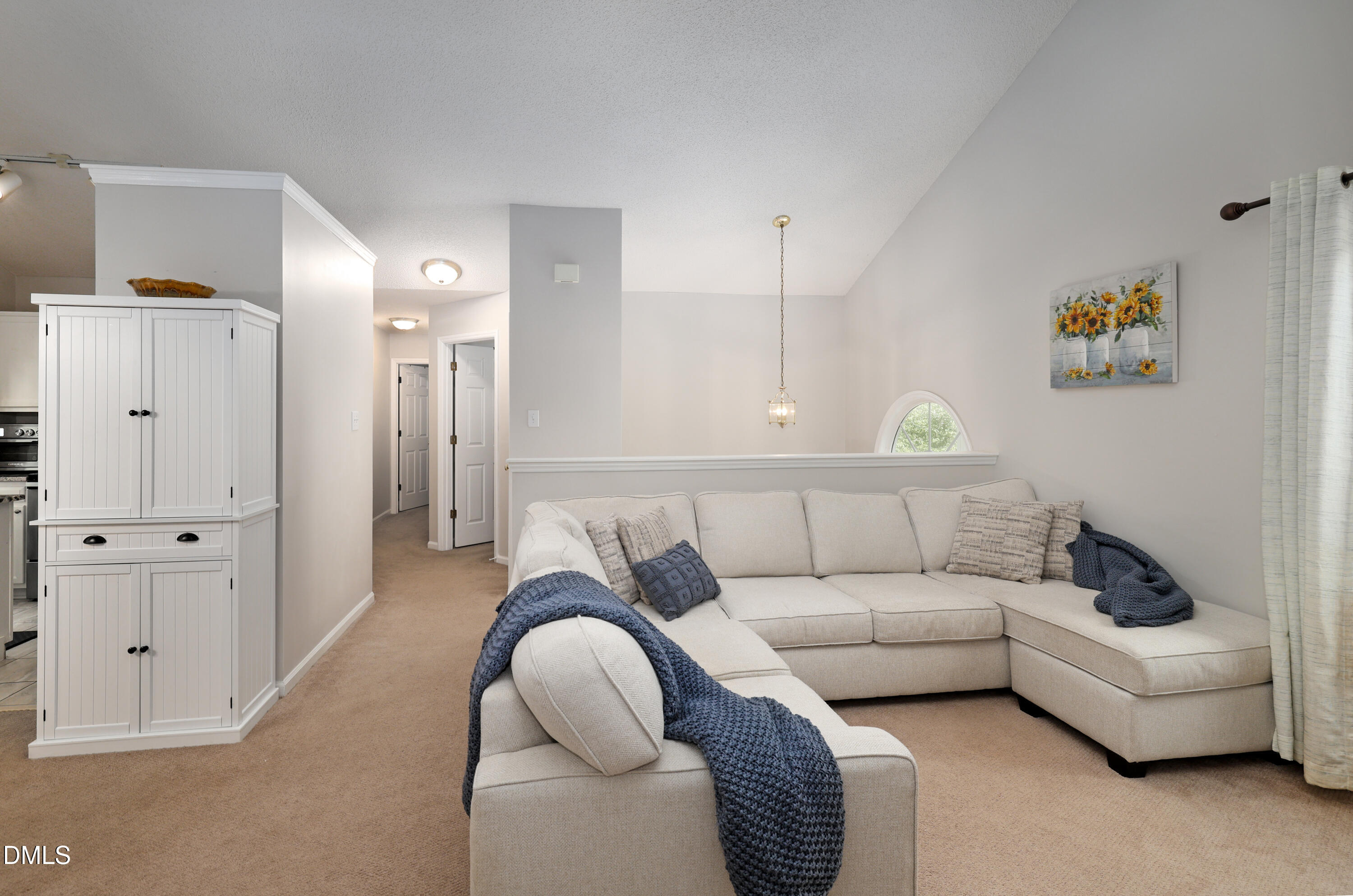 3011 Elk Ridge Road Durham, NC 27712 - Photo 22 of 68 a living room with furniture and white walls