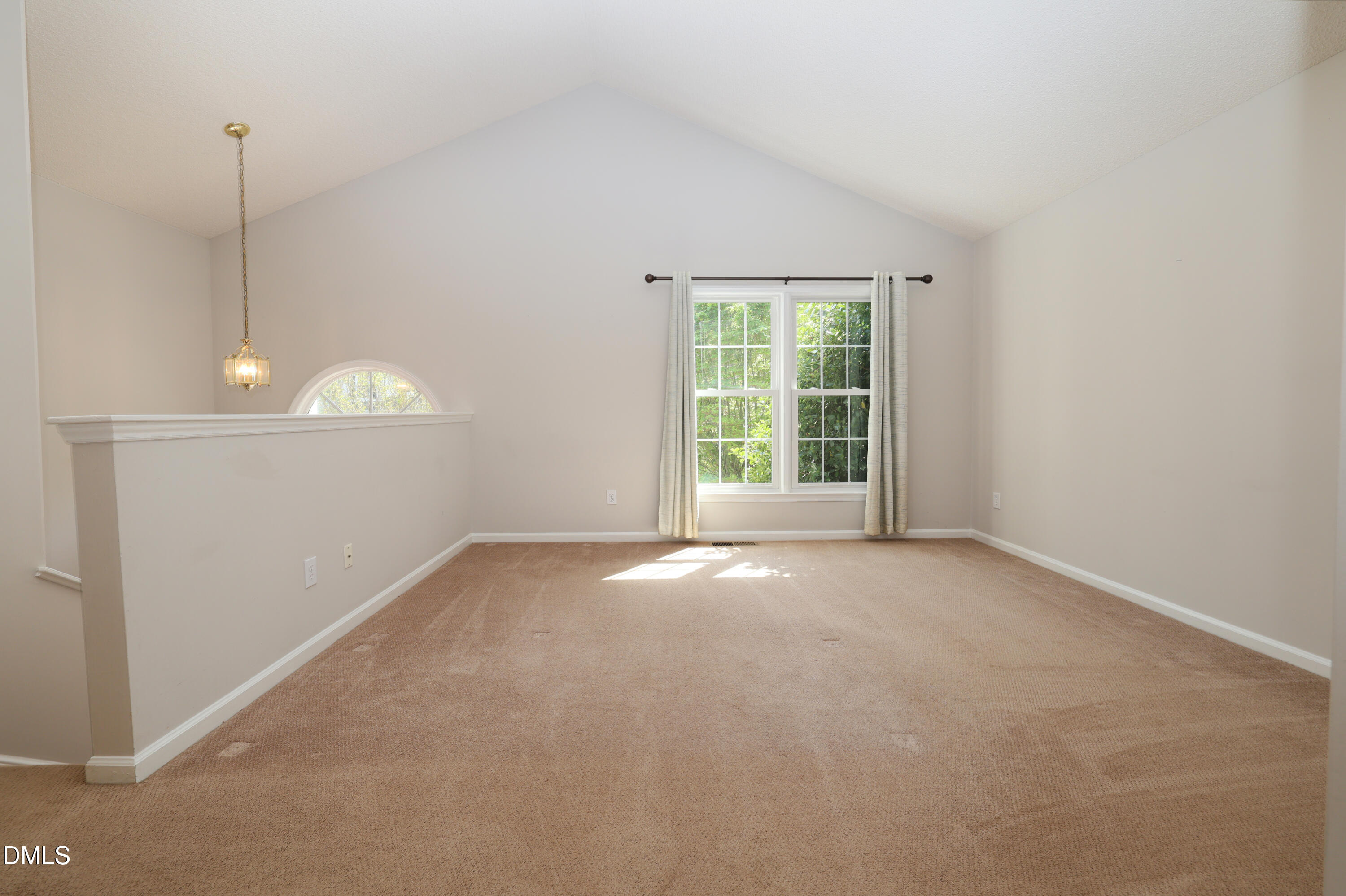 3011 Elk Ridge Road Durham, NC 27712 - Photo 24 of 68 a view of an empty room with a window