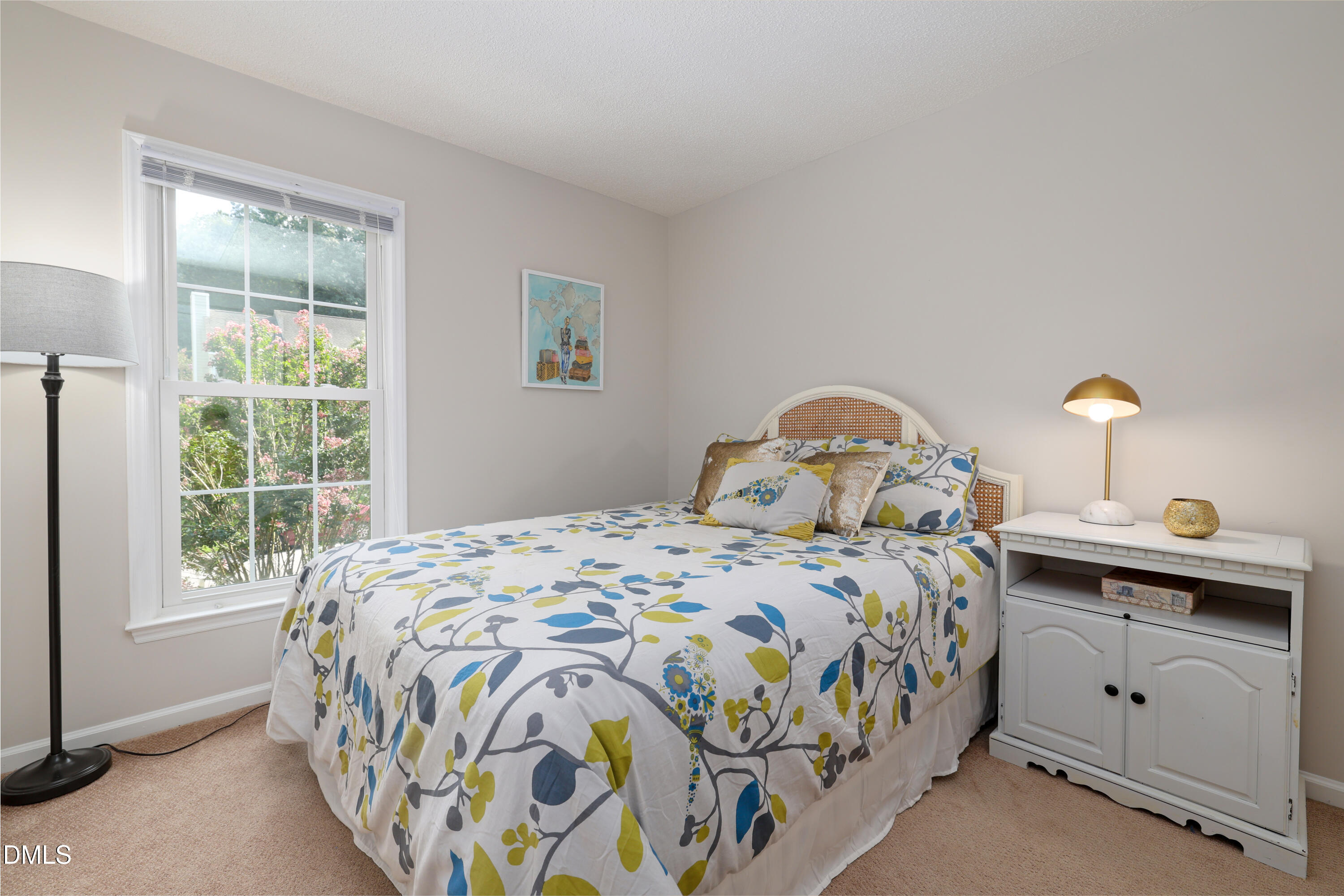 3011 Elk Ridge Road Durham, NC 27712 - Photo 29 of 68 a bedroom with a bed and a window