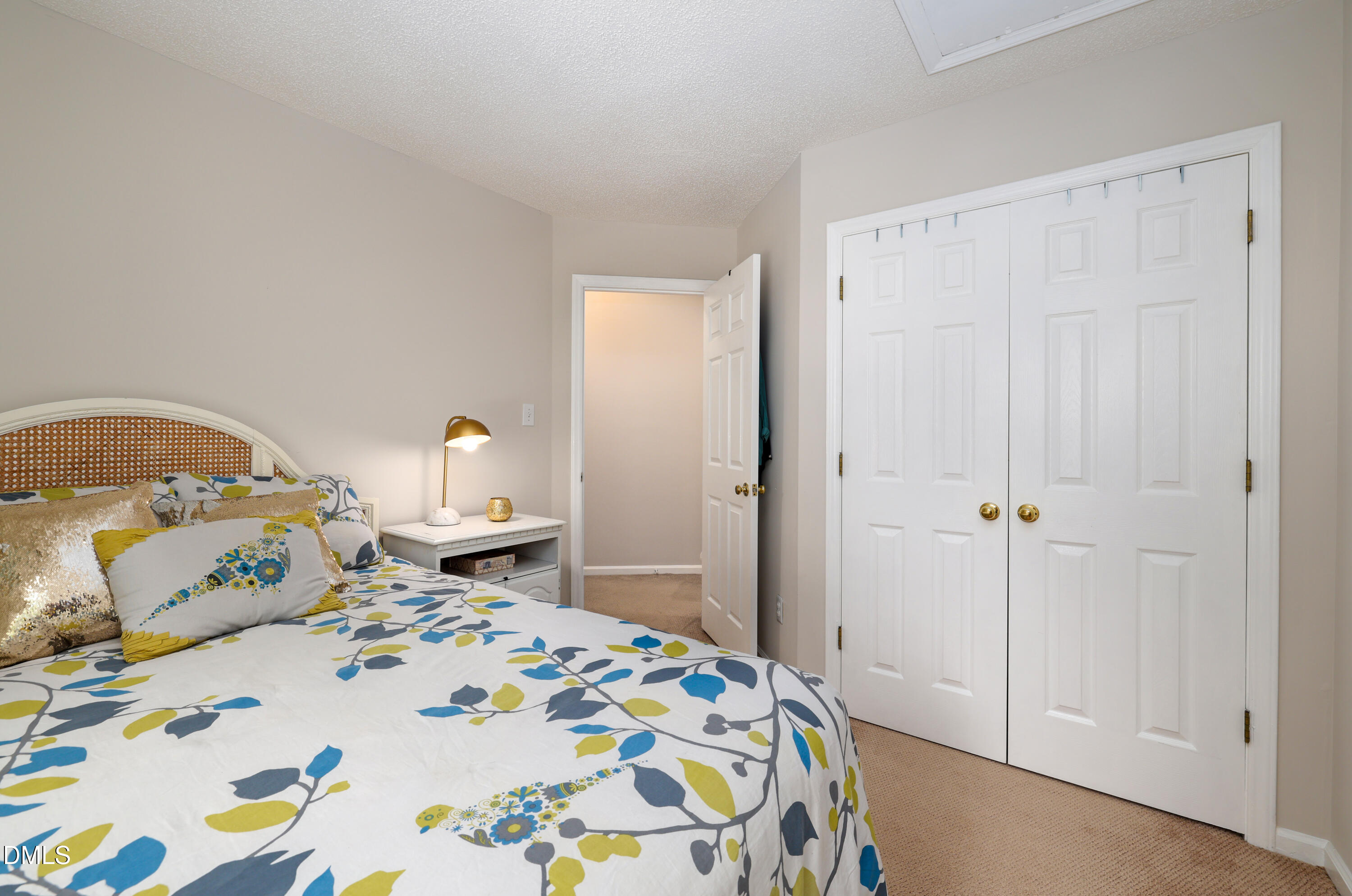 3011 Elk Ridge Road Durham, NC 27712 - Photo 30 of 68 a bedroom with a bed and a window