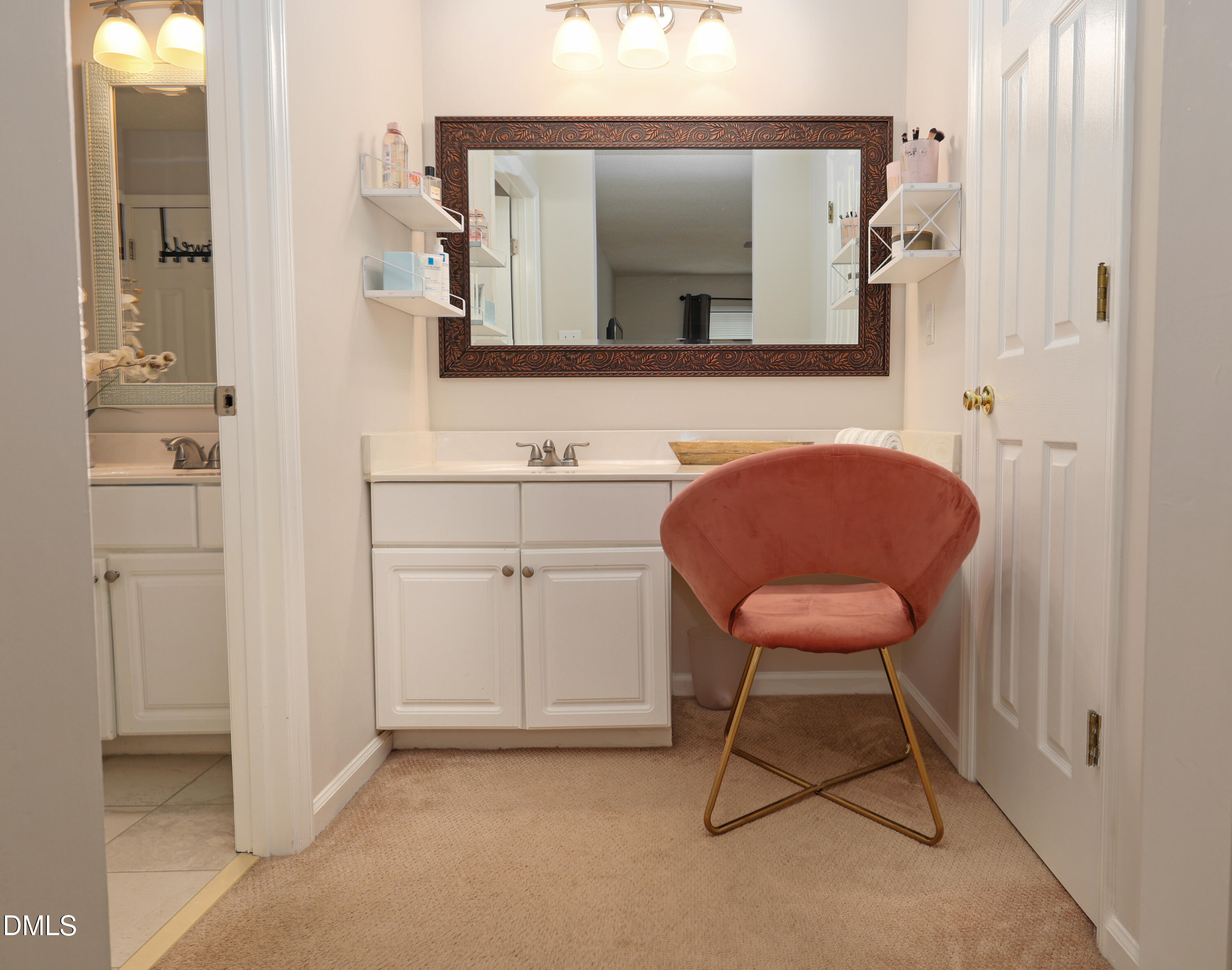 3011 Elk Ridge Road Durham, NC 27712 - Photo 36 of 68 a view of a chair and fire pit in a en suite bathroom
