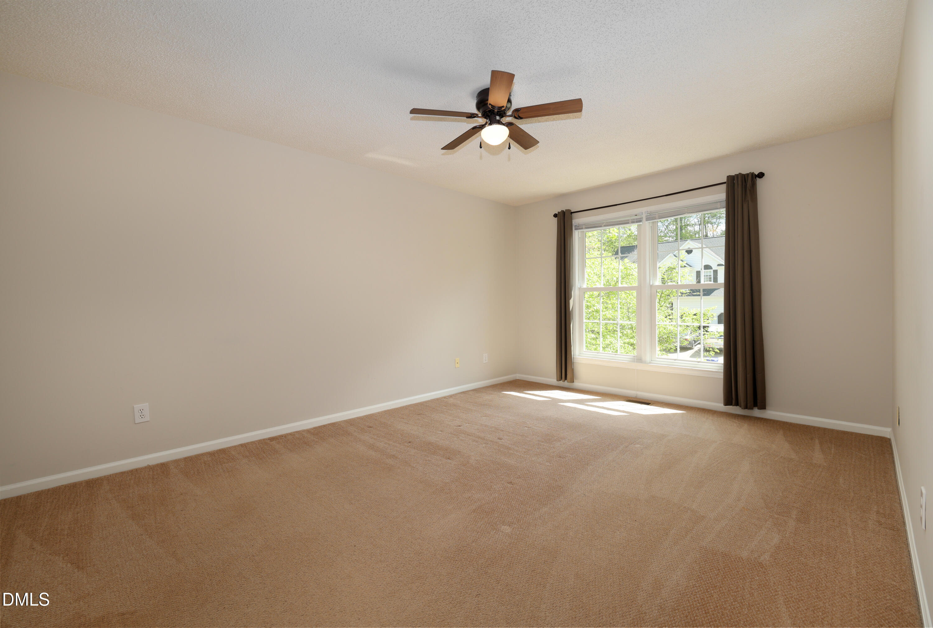 3011 Elk Ridge Road Durham, NC 27712 - Photo 39 of 68 a view of an empty room with a window