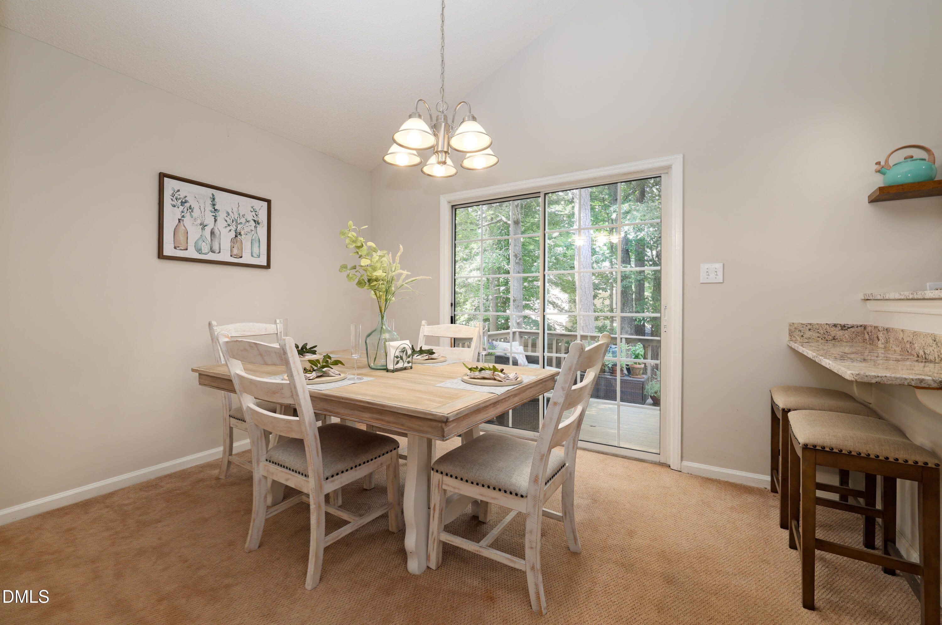 3011 Elk Ridge Road Durham, NC 27712 - Photo 7 of 68 a view of a dining room with furniture window and outside view