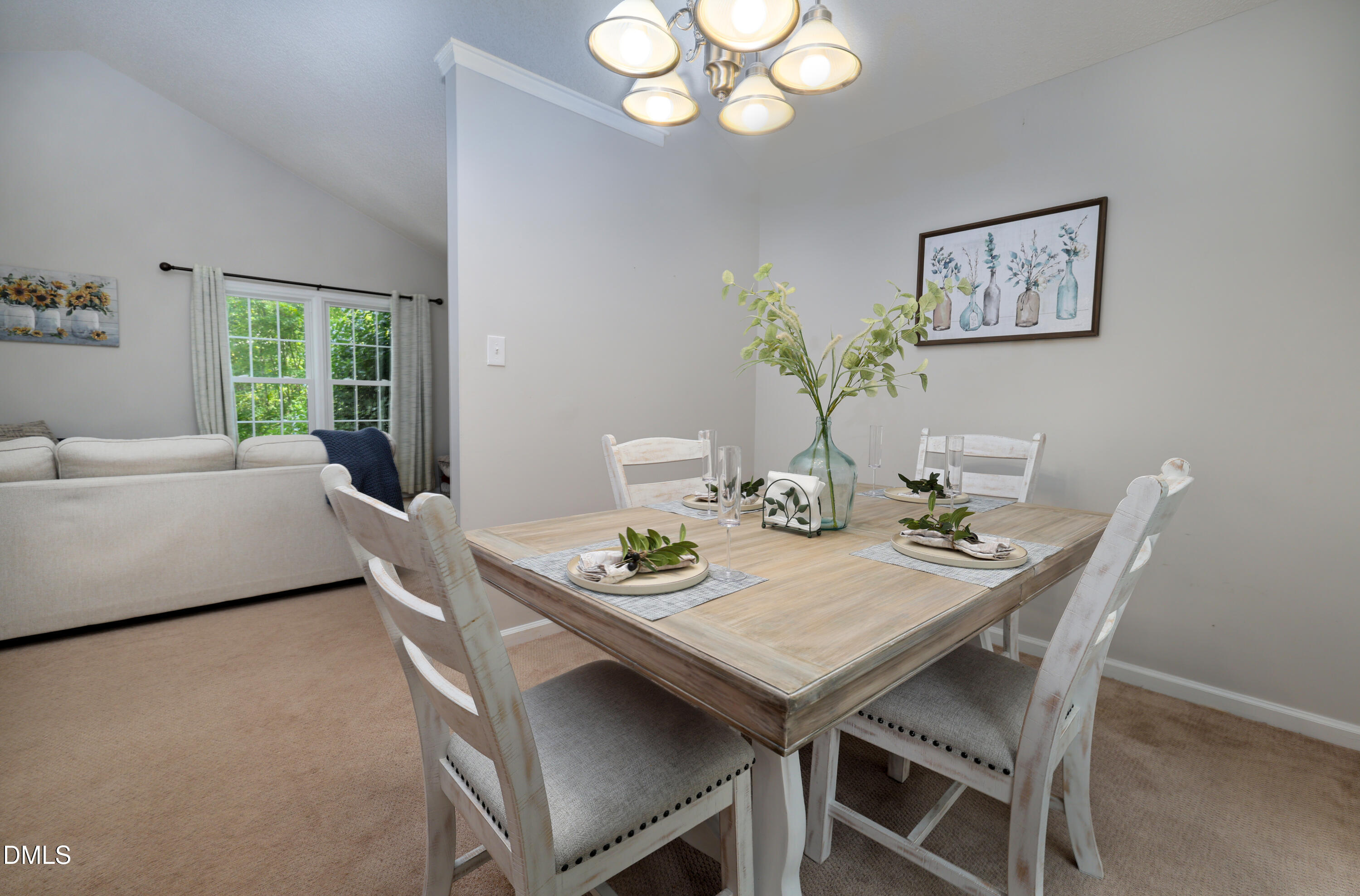 3011 Elk Ridge Road Durham, NC 27712 - Photo 8 of 68 a view of a dining room with furniture and a large window