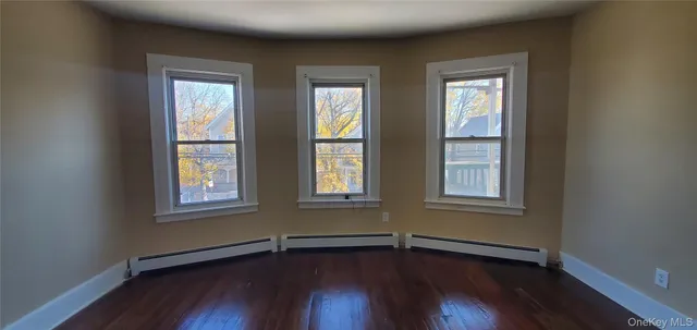 a view of a room that has a window in it