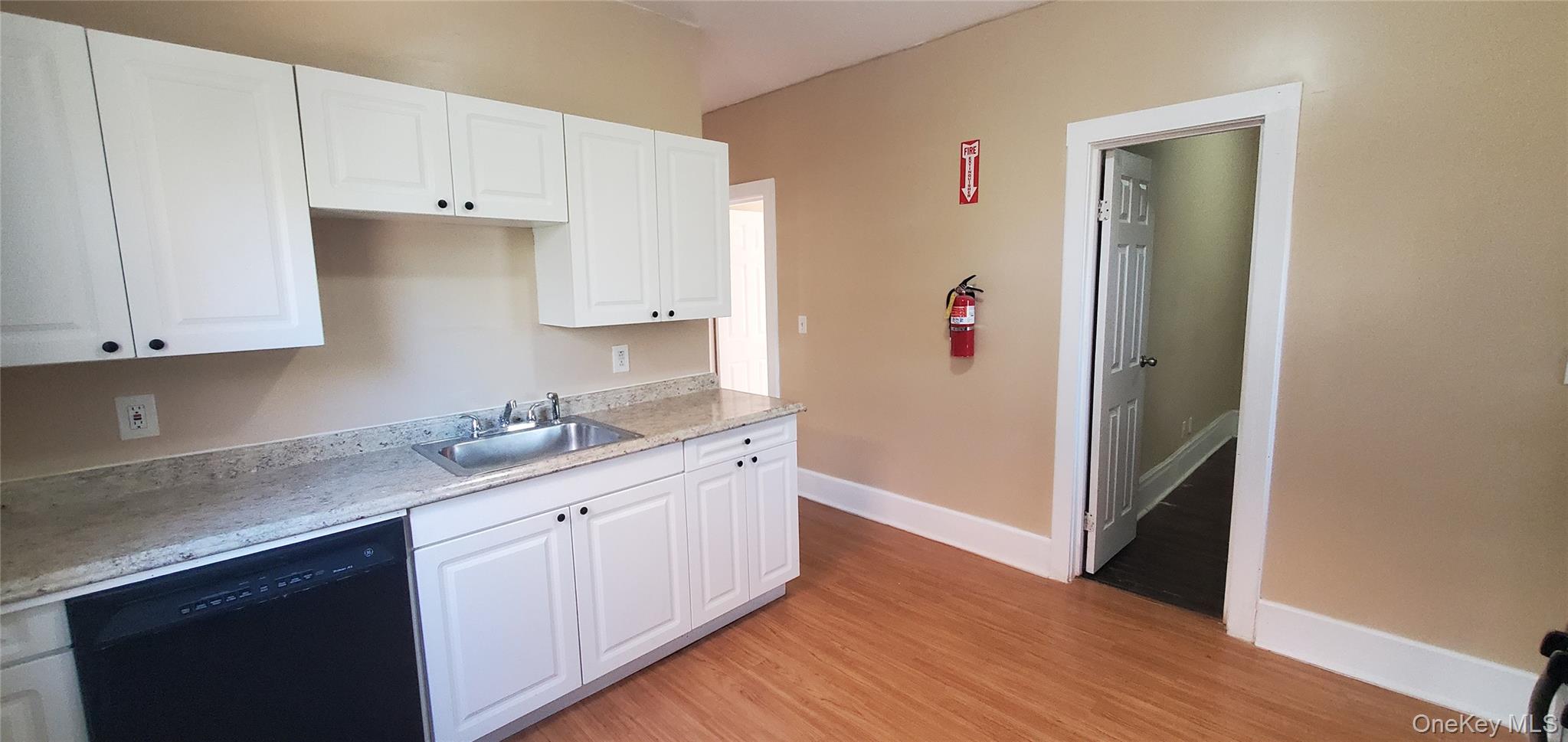 197 Winnikee Avenue, Unit 2 Poughkeepsie, NY 12601 - Photo 8 of 22 a kitchen with a sink and cabinets