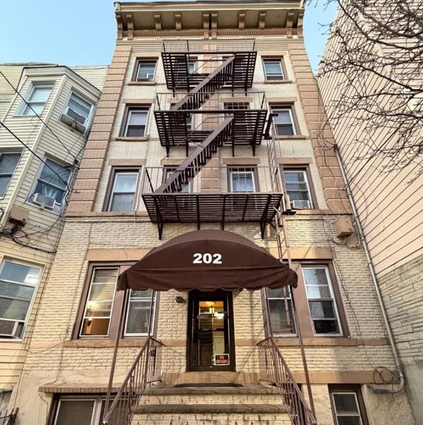 202 48th Street, Unit 3 Union City, NJ 07087 - Photo 10 of 10 a front view of a building