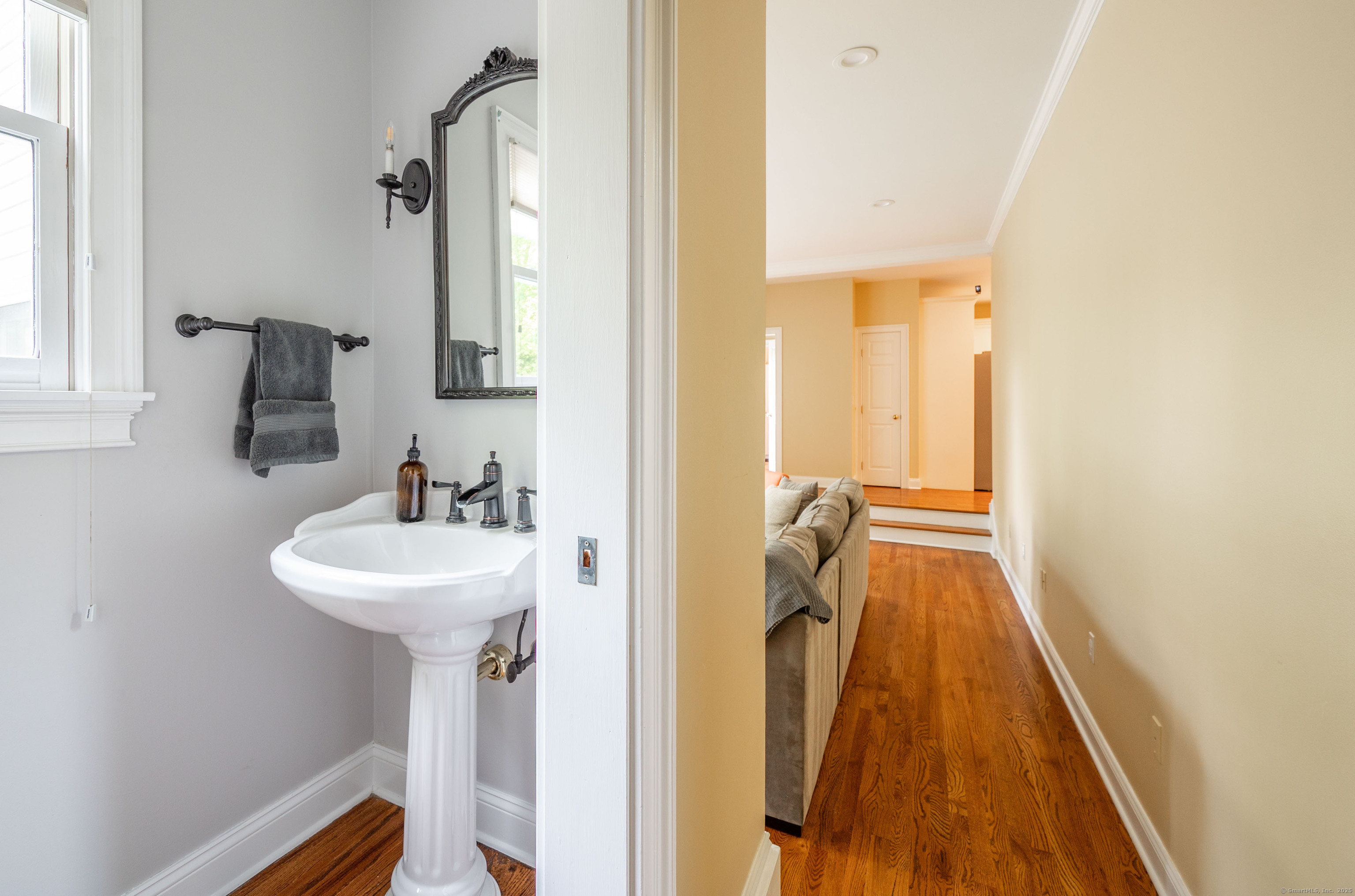 64 River Ford Road Brookfield, CT 06804 - Photo 12 of 28 a bathroom with a sink and mirror