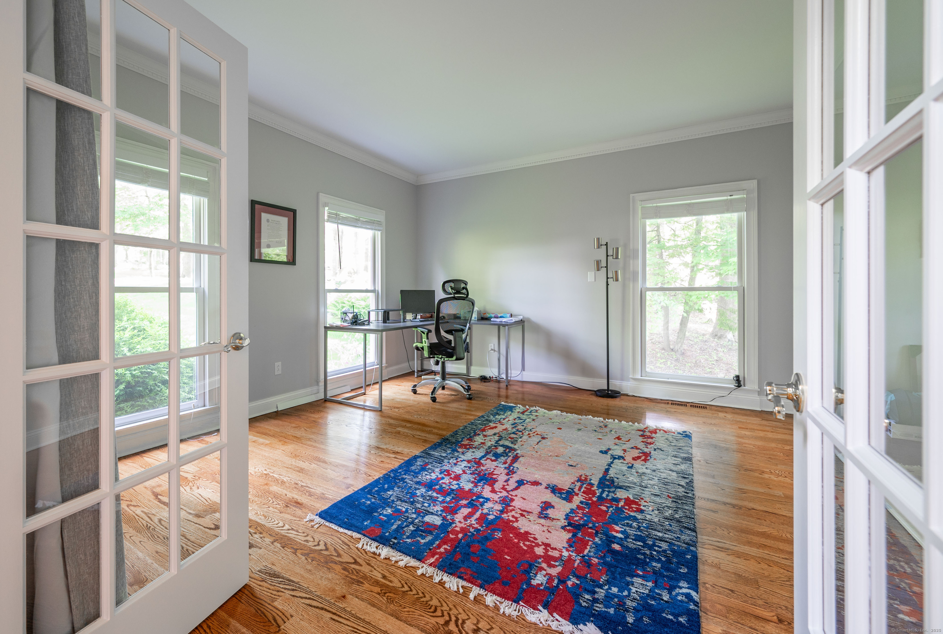64 River Ford Road Brookfield, CT 06804 - Photo 13 of 28 a living room with furniture and a wooden floor