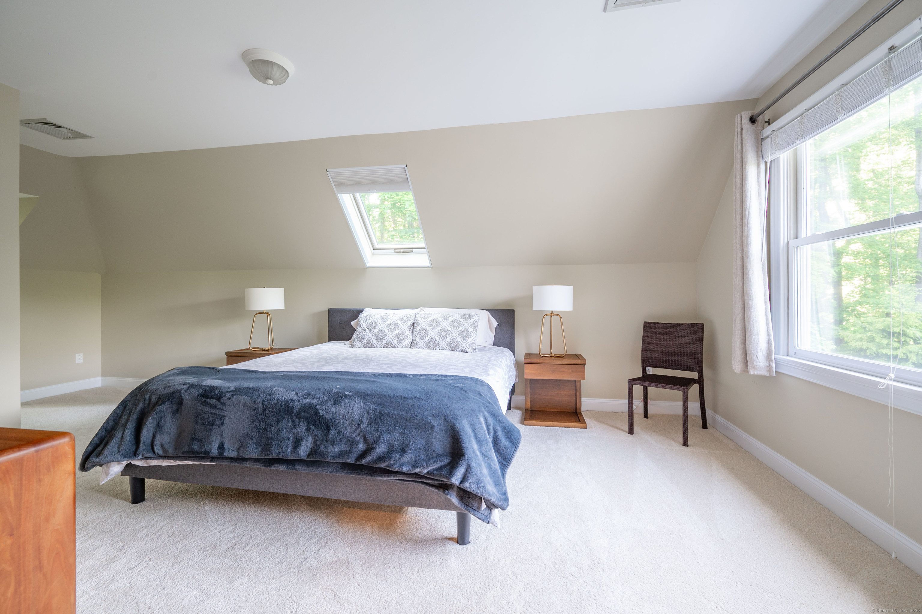 64 River Ford Road Brookfield, CT 06804 - Photo 15 of 28 a spacious bedroom with a bed and a window
