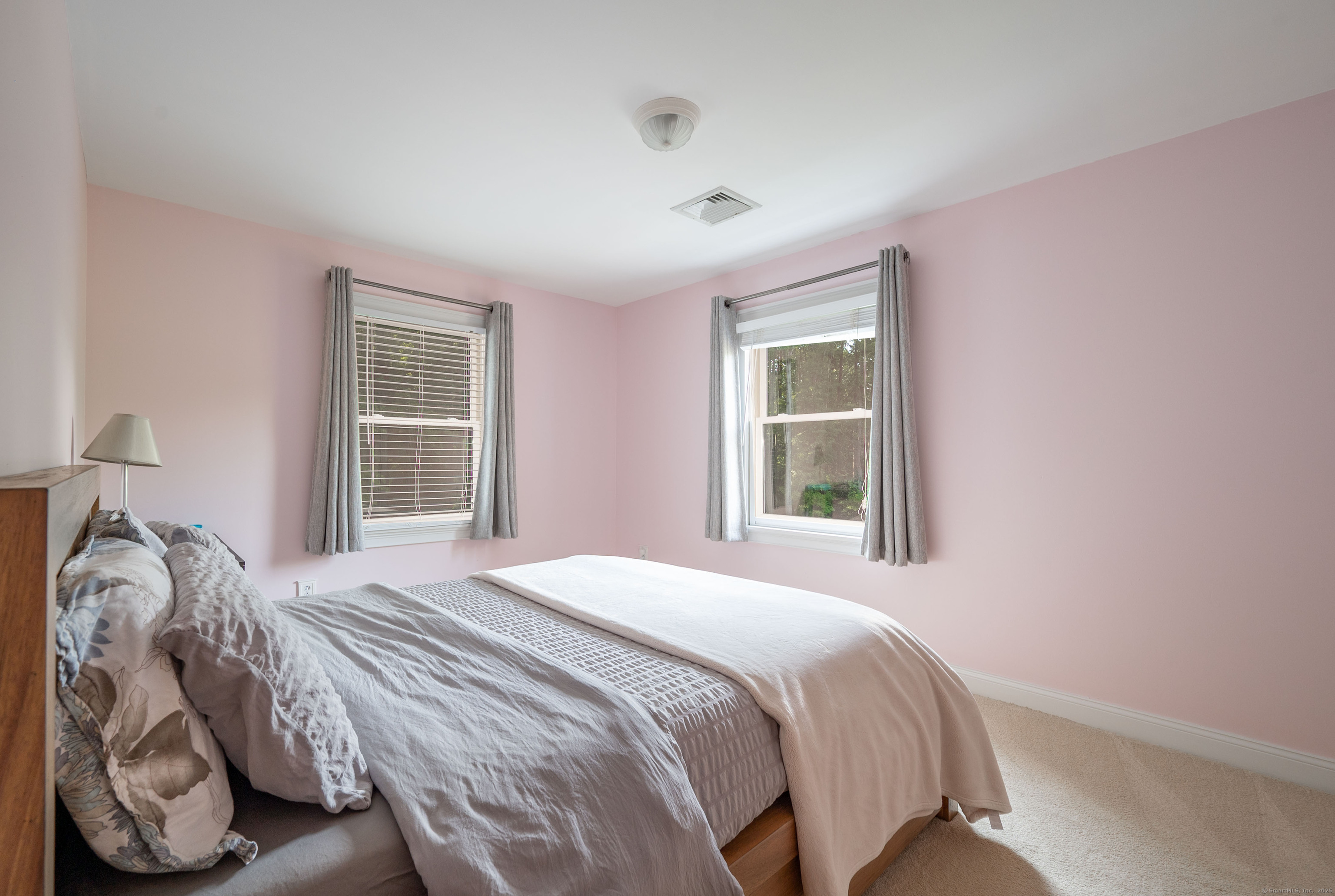 64 River Ford Road Brookfield, CT 06804 - Photo 17 of 28 a bedroom with a bed and a window