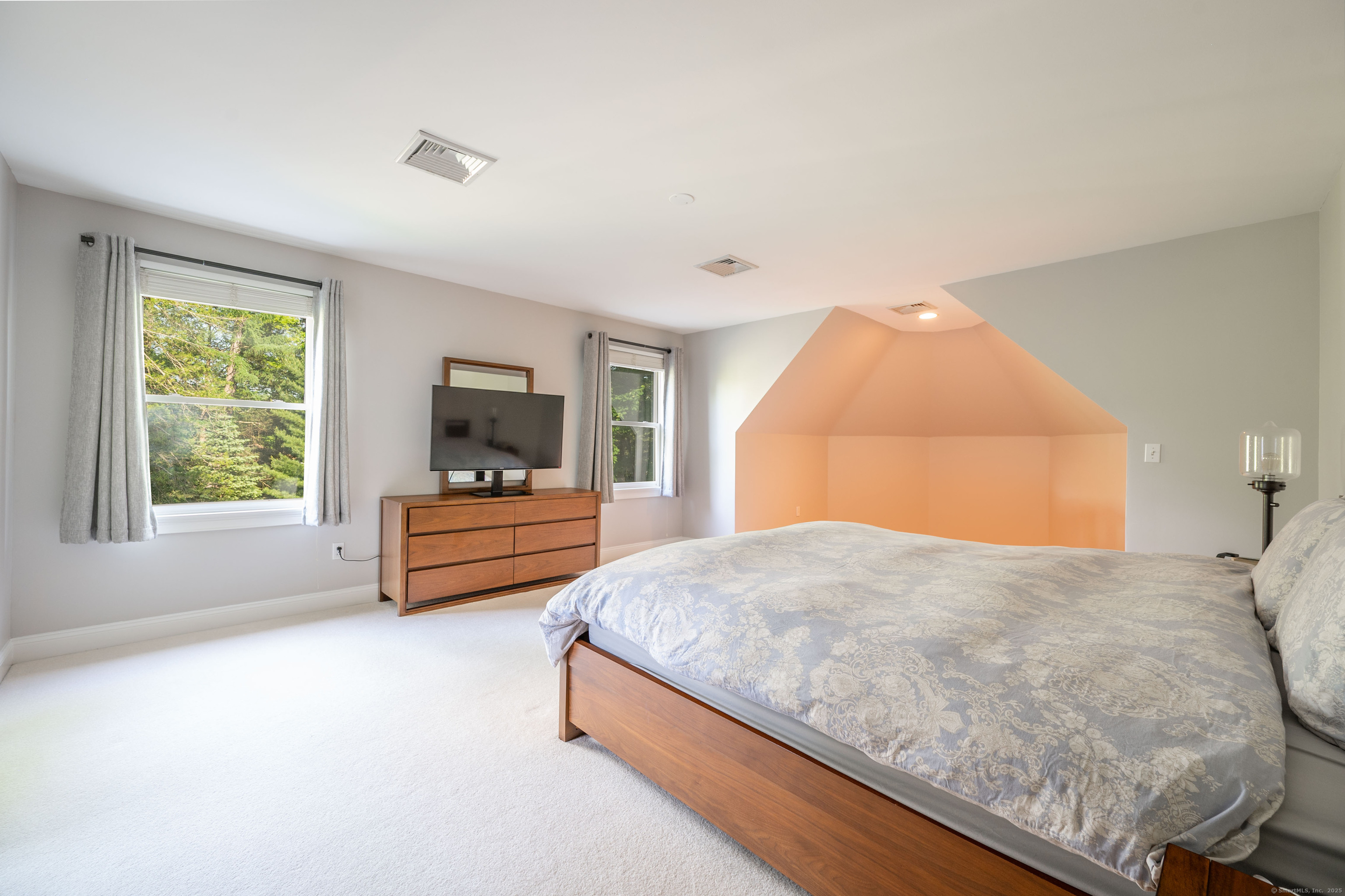 64 River Ford Road Brookfield, CT 06804 - Photo 19 of 28 a bedroom with a bed and window