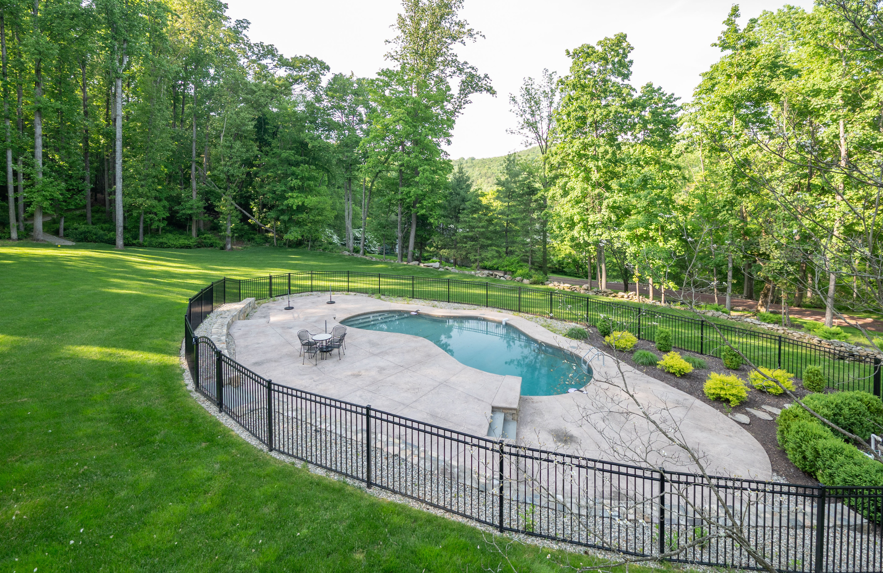 64 River Ford Road Brookfield, CT 06804 - Photo 22 of 28 a view of a backyard with a garden