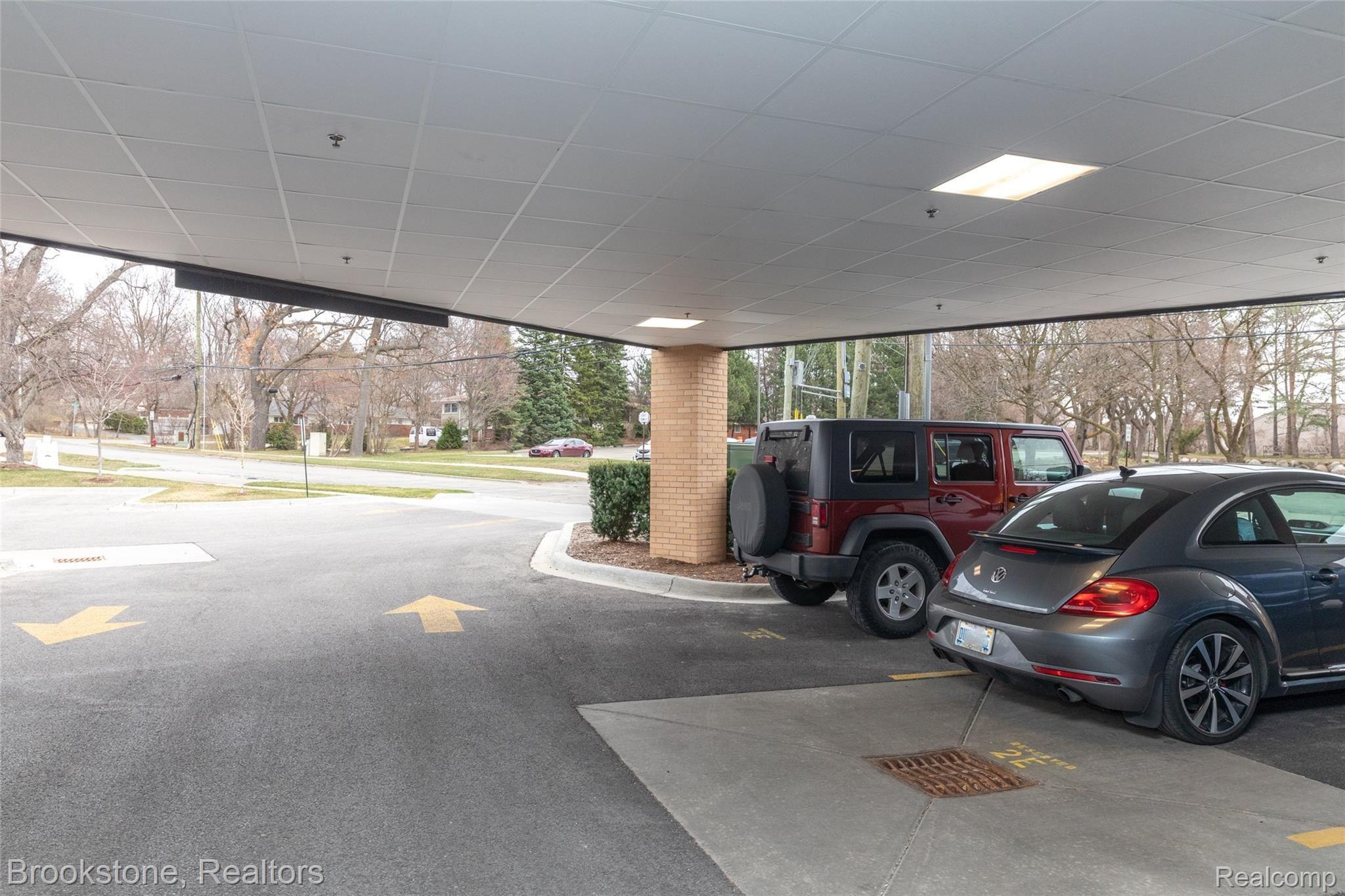 804 North Main Street, Unit 2E(#7) Rochester, MI 48307 - Photo 22 of 24 2 Assigned Covered Garage parking spaces