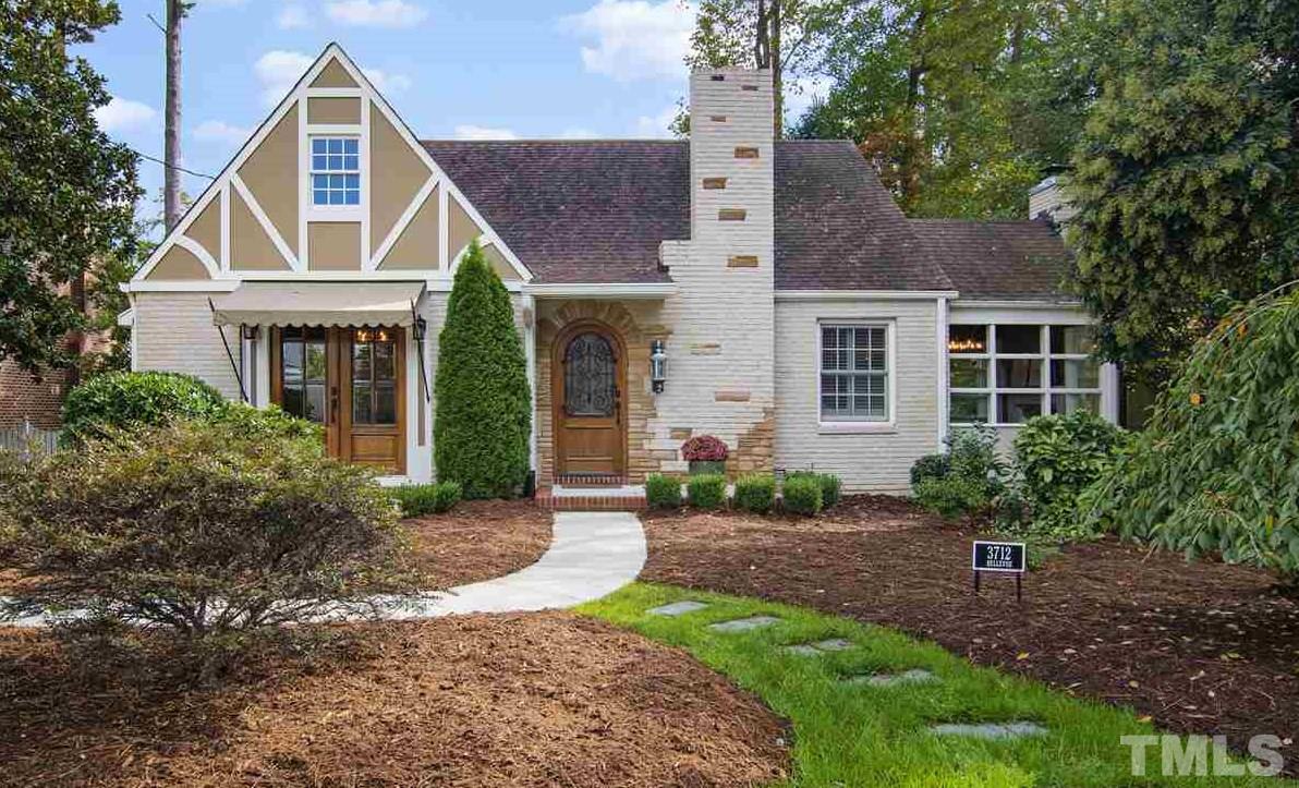 3712 Bellevue Road Raleigh, NC 27609 - Photo 1 of 30 This precious English cottage home was remodeled in 2015. The Tudor style arched door is accented with wrought iron. Handsome brick with stone accents are a nice touch. The patio is off of the dining room and there is a decorative stoop at the front door.