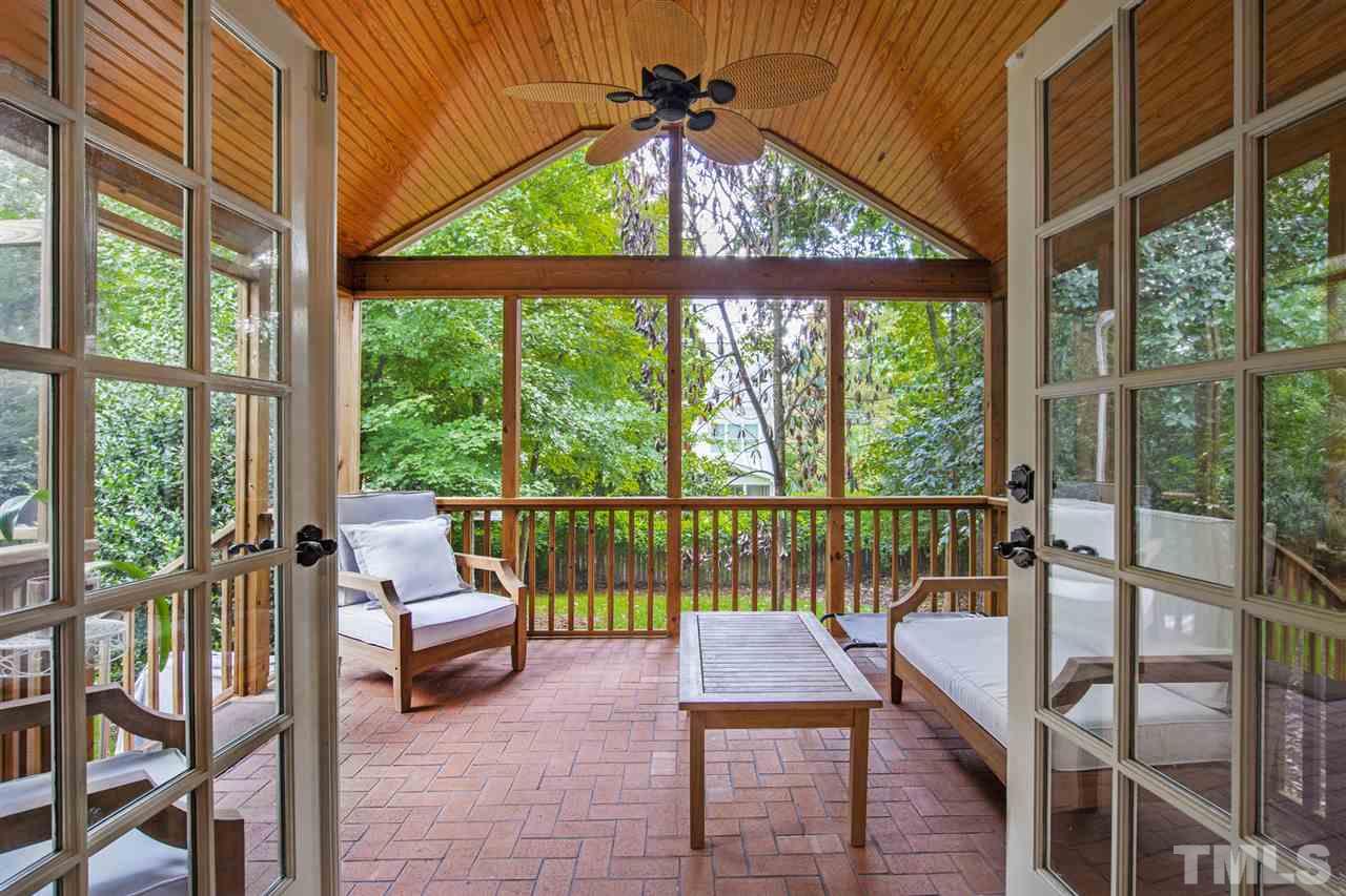 3712 Bellevue Road Raleigh, NC 27609 - Photo 20 of 30 French doors from master bedroom open to screened porch with raised ceiling and ceiling fan.