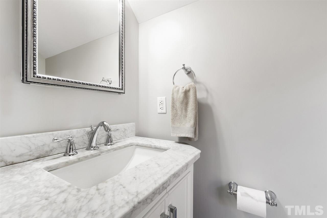 3712 Bellevue Road Raleigh, NC 27609 - Photo 24 of 30 2nd Bath with jetted tub, solid surface vanity top, medicine cabinet and elongated toilet.