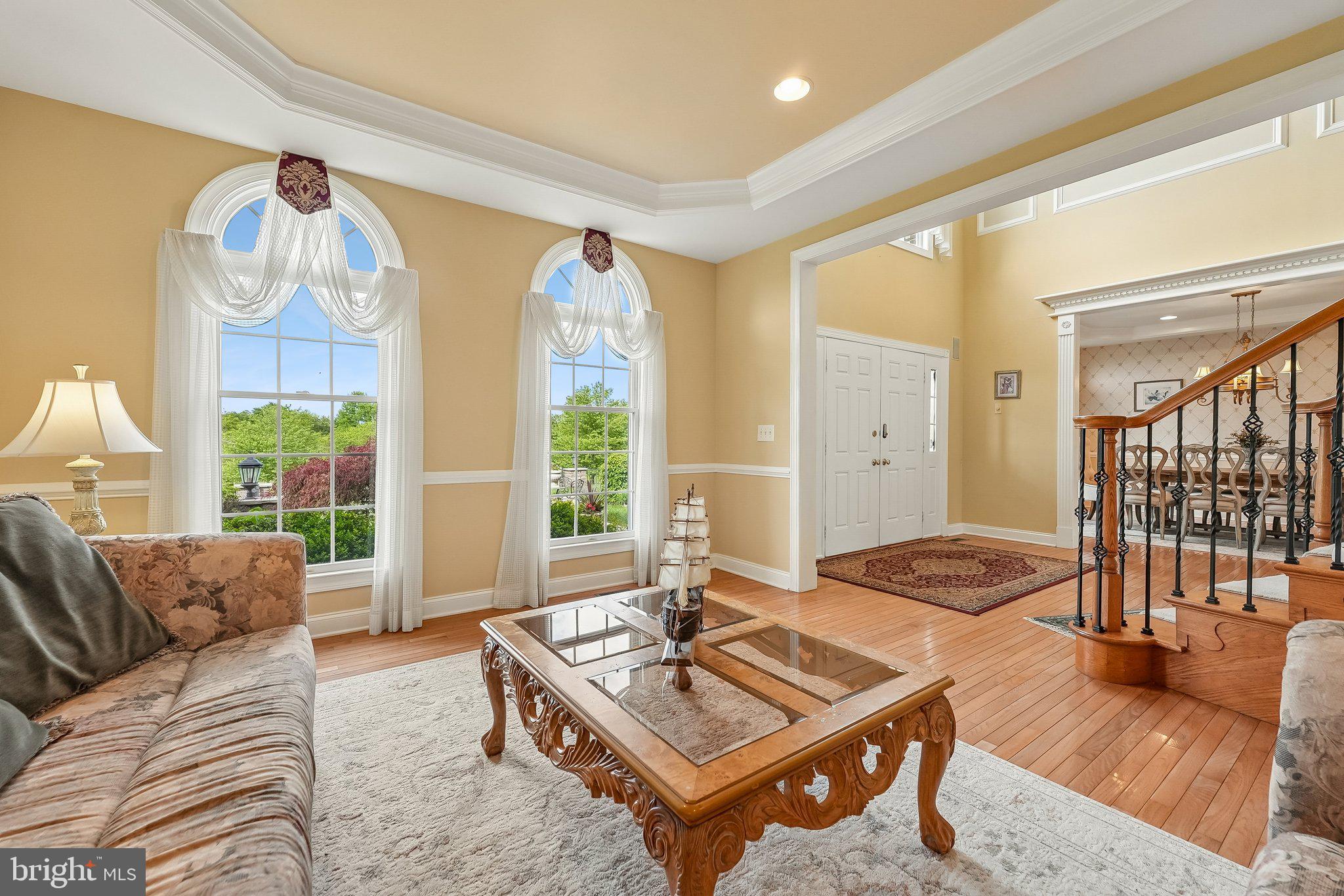 1 Baker Way Pennington, NJ 08534 - Photo 13 of 77 a living room with furniture a table and a large window