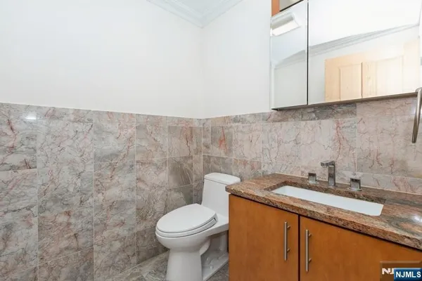 a bathroom with a sink and a toilet