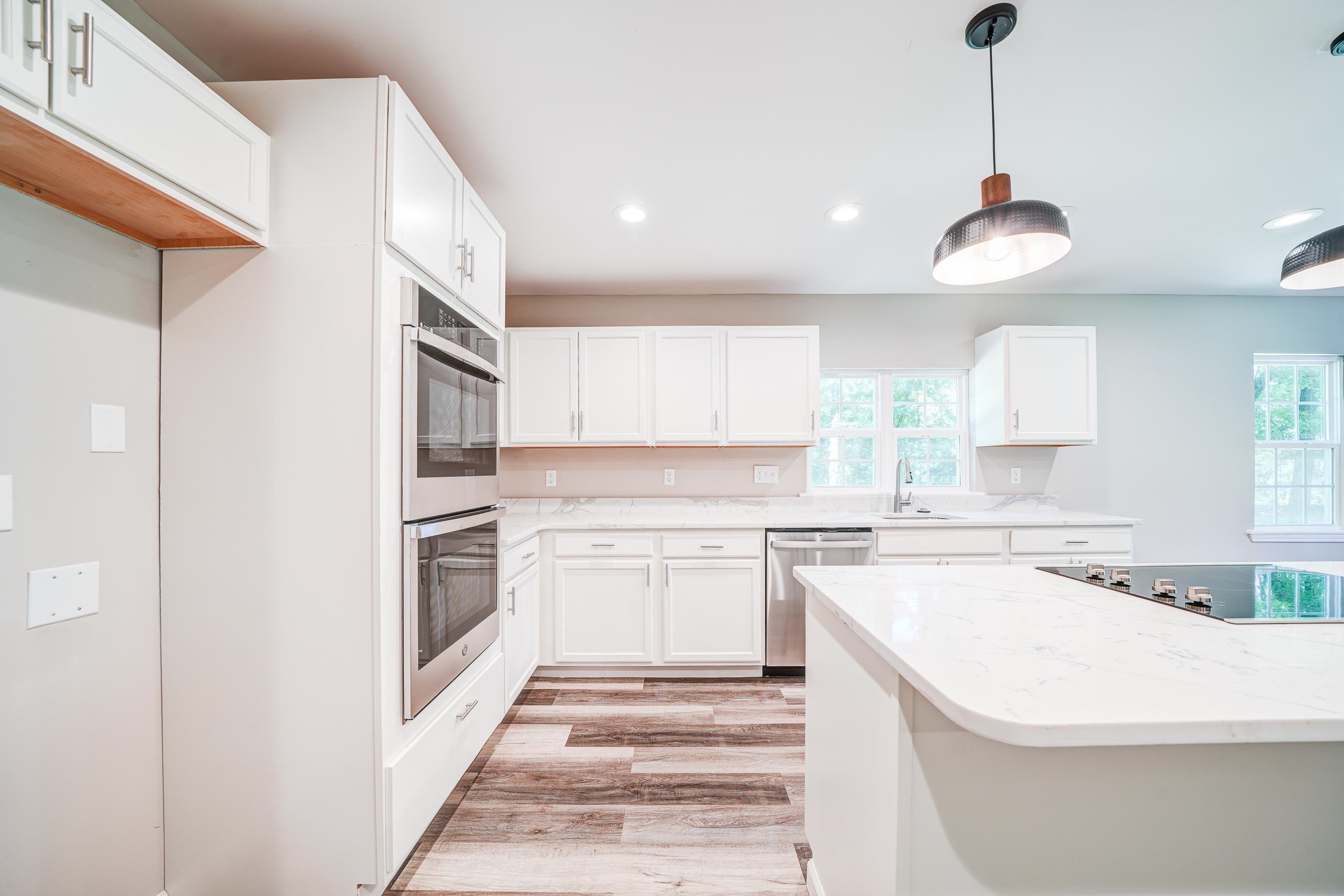4630 Billy Maher Road Bartlett, TN 38135 - Photo 15 of 40 a kitchen with a sink stove and cabinets