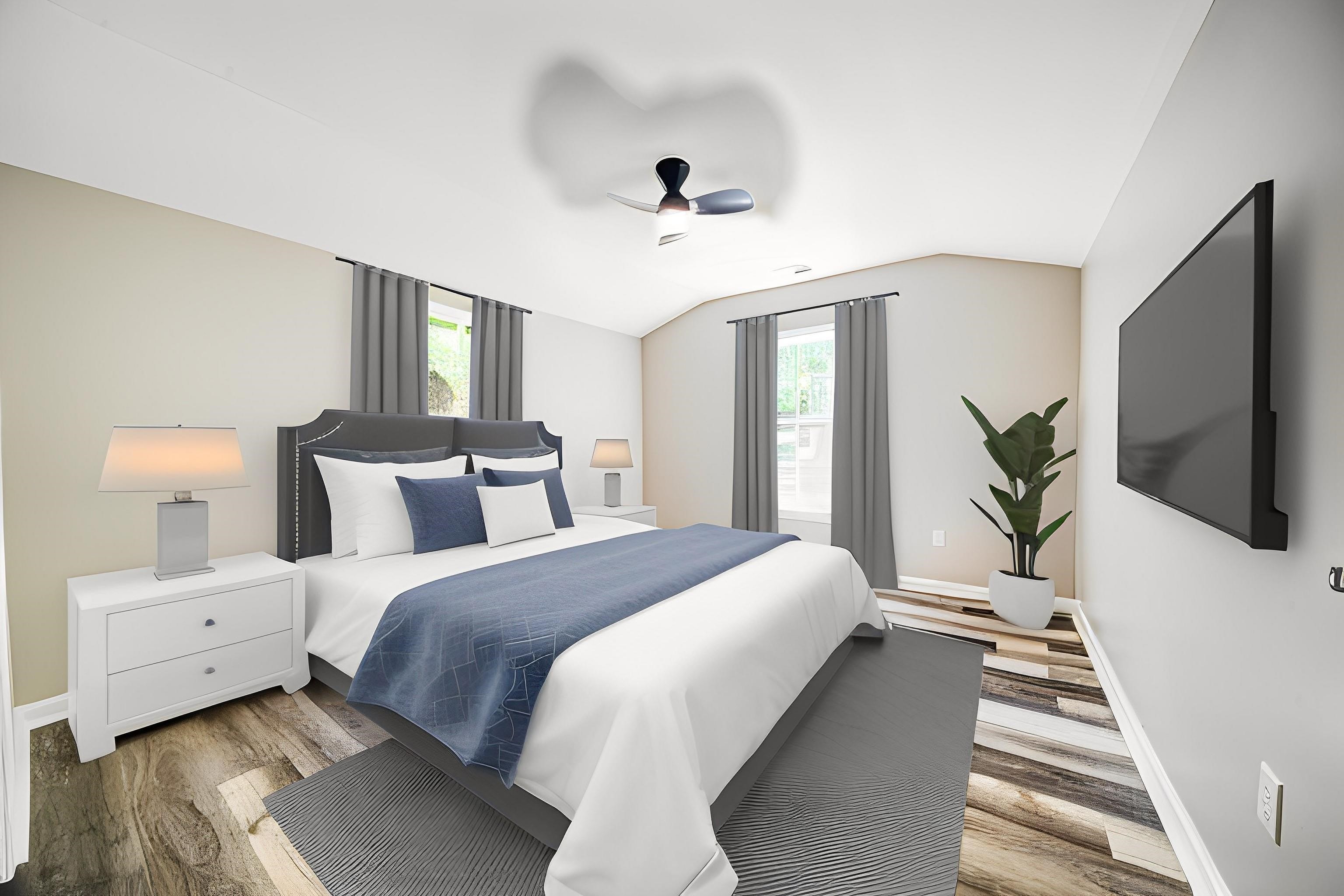 4630 Billy Maher Road Bartlett, TN 38135 - Photo 24 of 40 a bedroom with bed and a flat tv screen on dresser