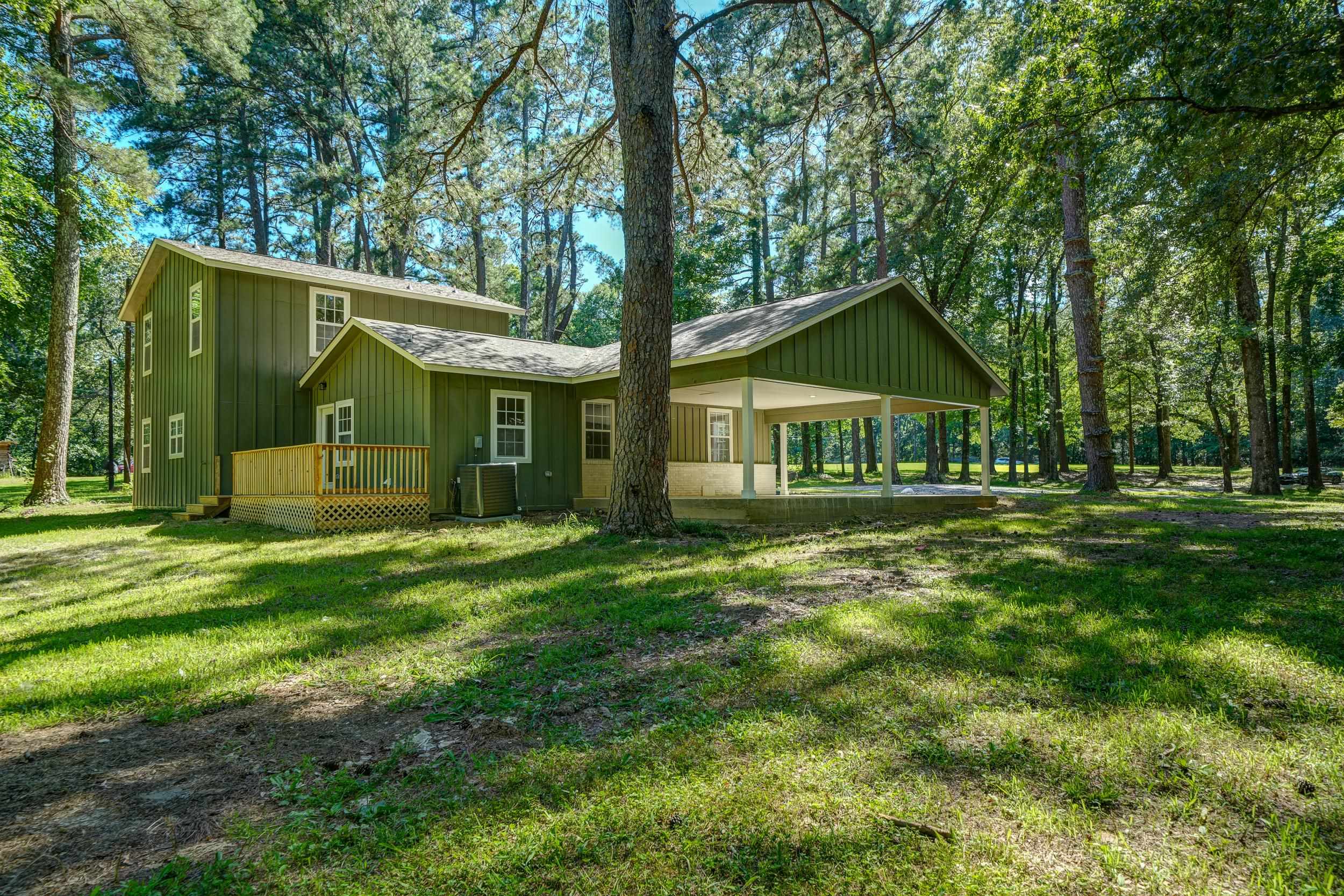 4630 Billy Maher Road Bartlett, TN 38135 - Photo 32 of 40 a view of a house with a big yard and large trees