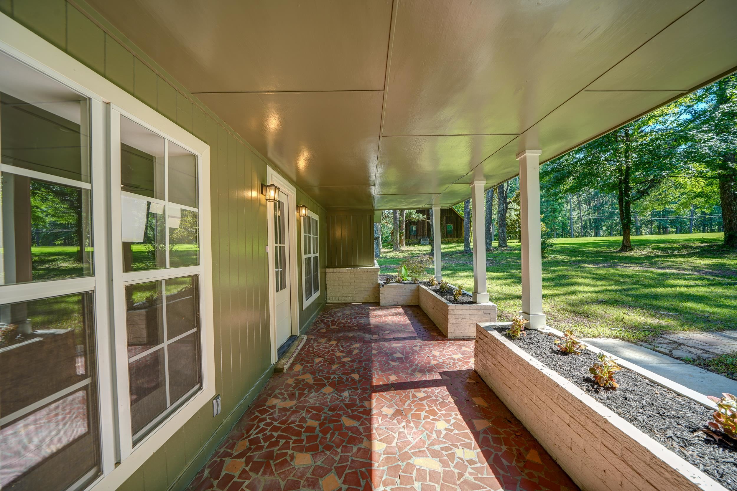 4630 Billy Maher Road Bartlett, TN 38135 - Photo 7 of 40 a house view with a sitting space and garden space