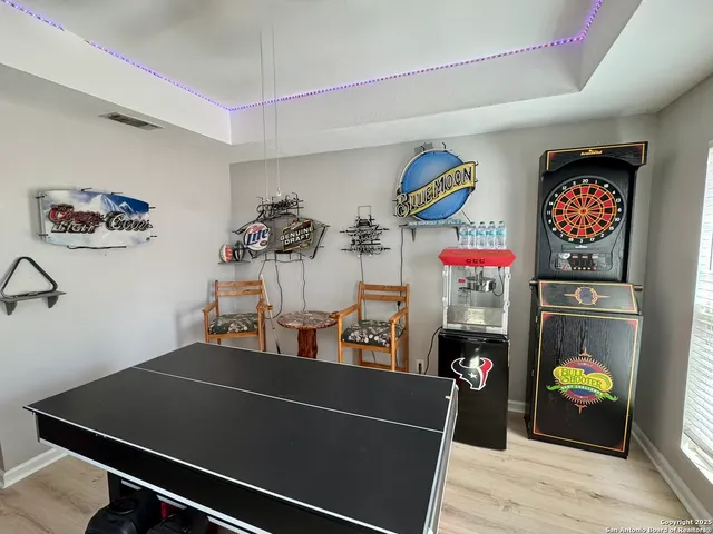 a living room with furniture and a couch