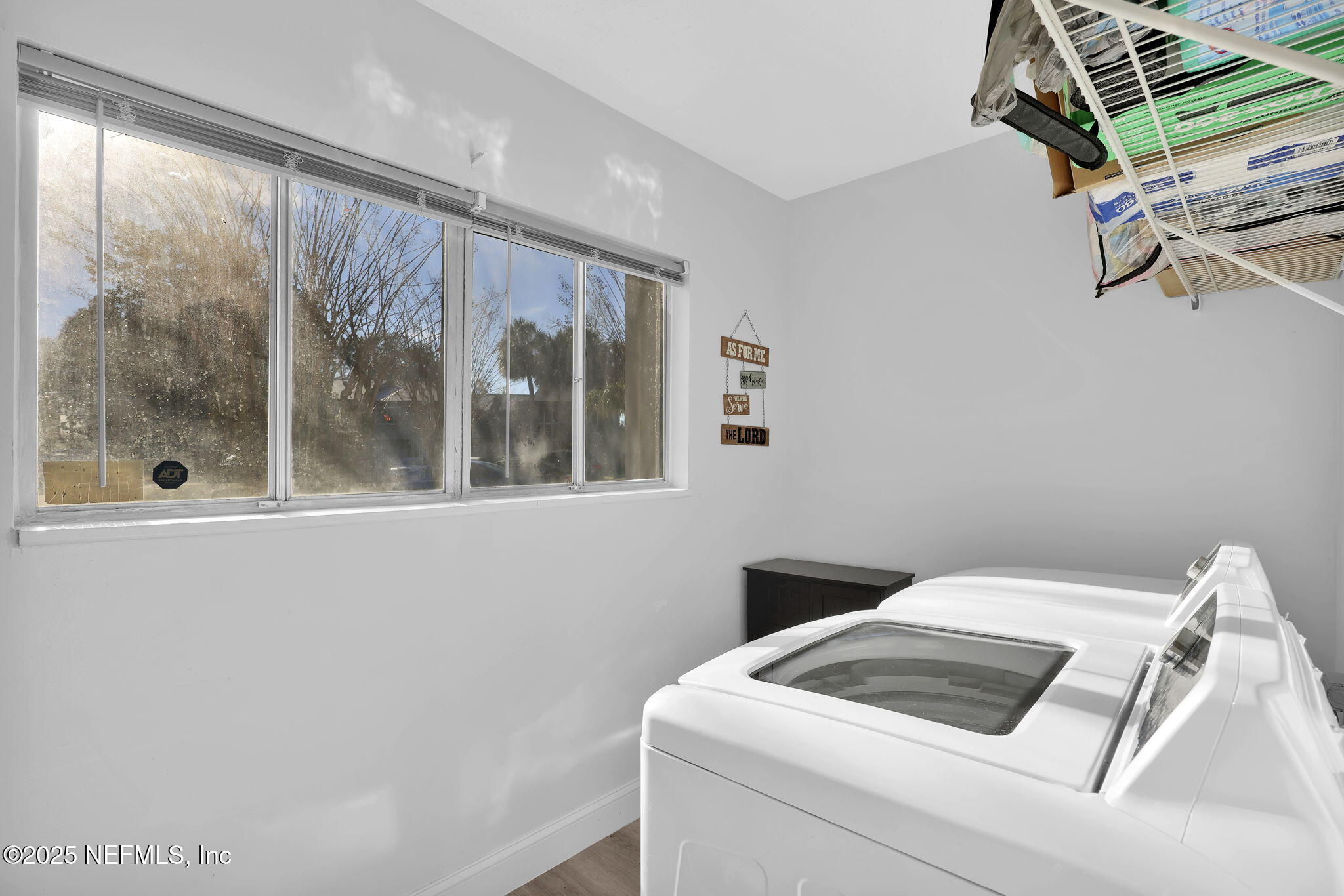 7170 Cypress Cove Road, Unit 28 Jacksonville, FL 32244 - Photo 13 of 22 a utility room with dryer and washer