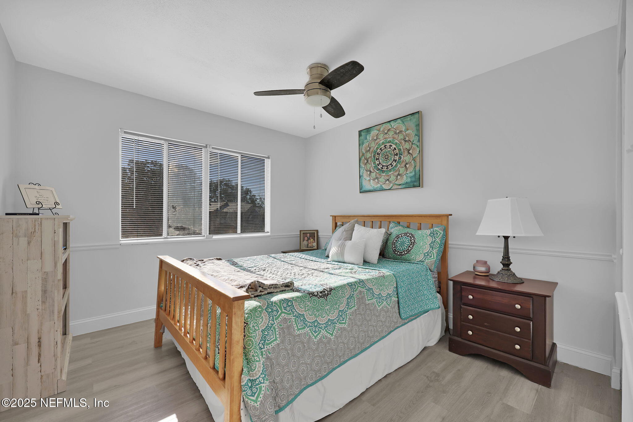 7170 Cypress Cove Road, Unit 28 Jacksonville, FL 32244 - Photo 14 of 22 a bedroom with a bed and a window