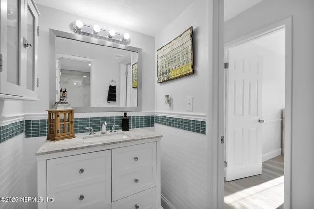 a bathroom with a toilet a sink and bathtub