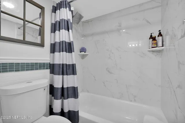 a view of a workspace with furniture