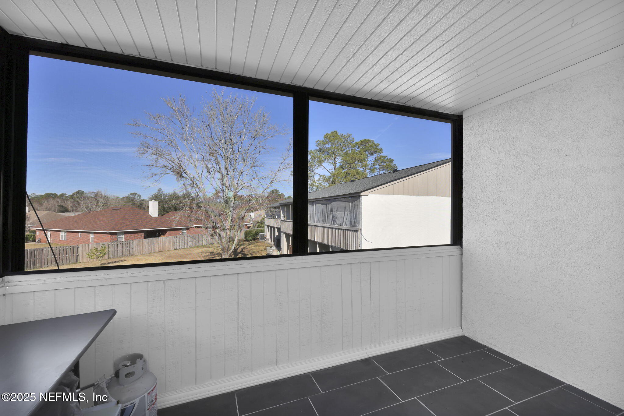 7170 Cypress Cove Road, Unit 28 Jacksonville, FL 32244 - Photo 18 of 22 a view of a door and a window