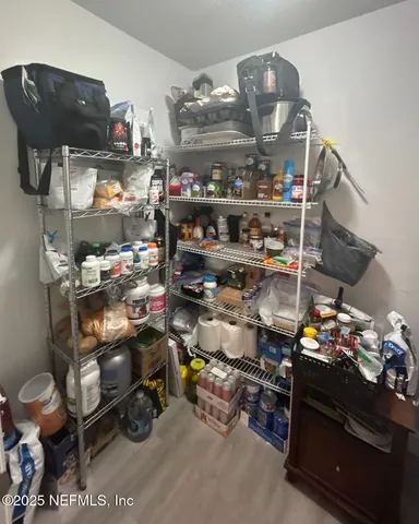 a room with lots of different colored cloths