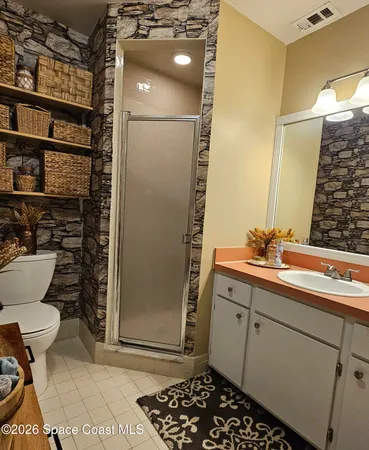 a bathroom with a sink and a toilet