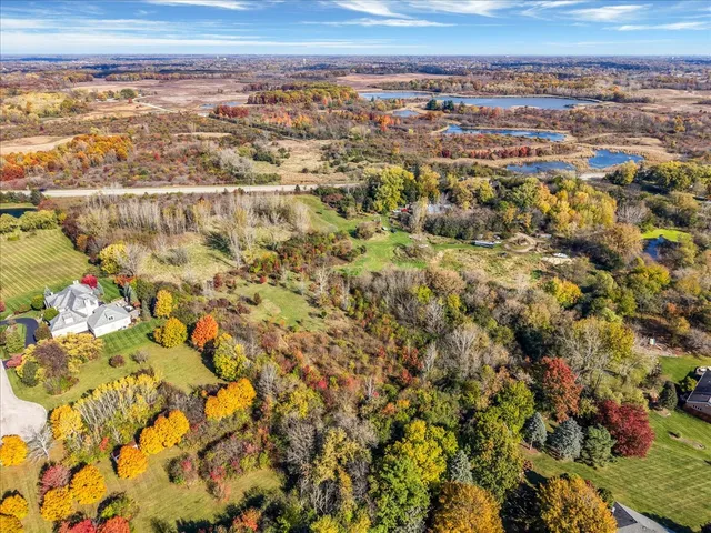 an aerial view of residential building with parking space