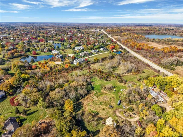 an aerial view of residential building with parking space