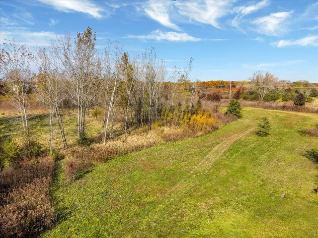 an aerial view of residential building and lake view