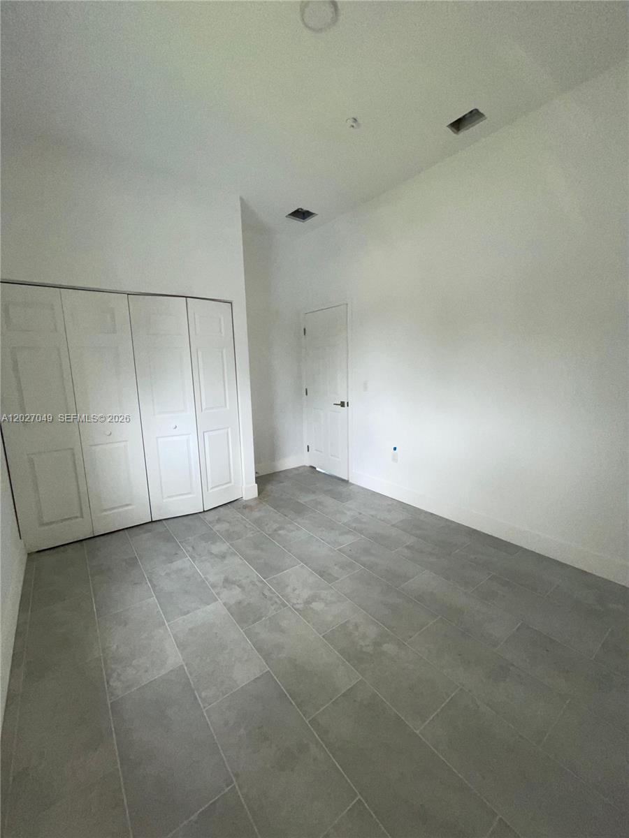 263 Northwest 58th Street Miami, FL 33127 - Photo 1 of 1 a view of an empty room