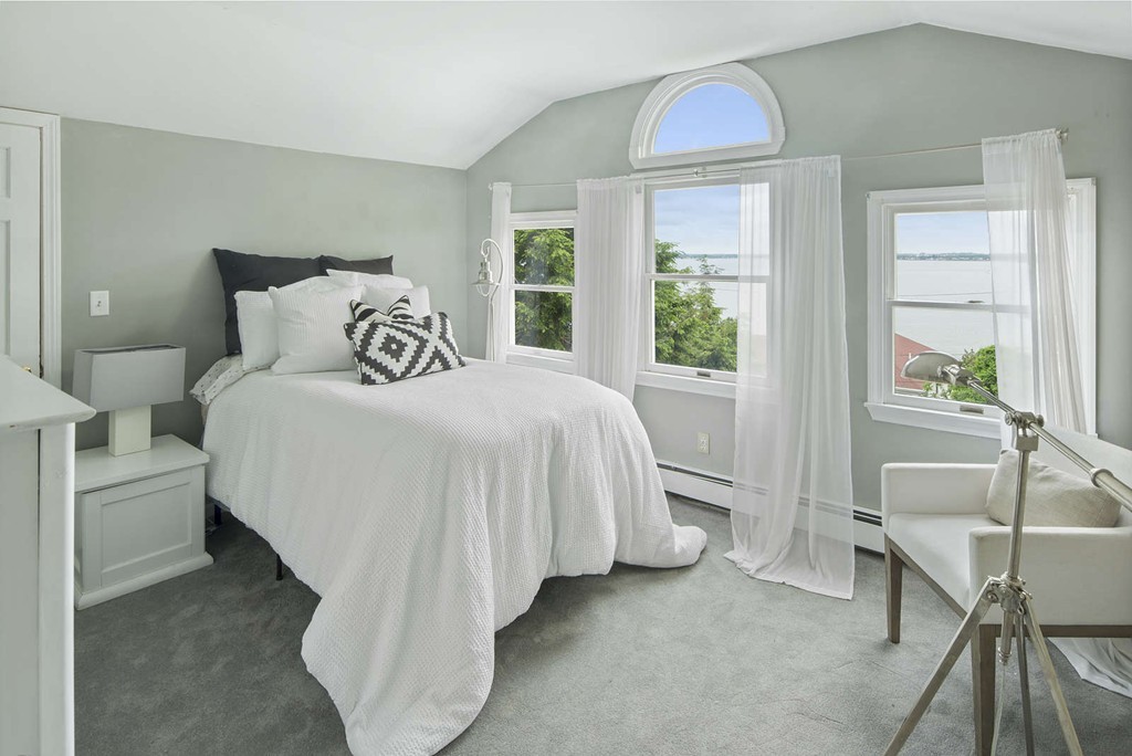 23 Crabtree Road Quincy, MA 02171 - Photo 13 of 20 a bedroom with a bed and a table