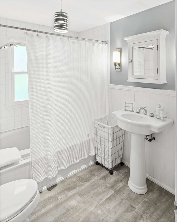 23 Crabtree Road Quincy, MA 02171 - Photo 14 of 20 a bathroom with a sink toilet and shower