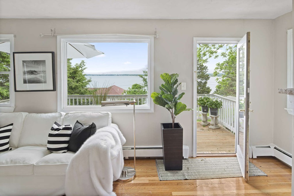 23 Crabtree Road Quincy, MA 02171 - Photo 5 of 20 a living room with furniture and a potted plant