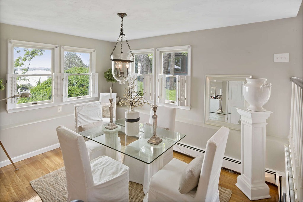 23 Crabtree Road Quincy, MA 02171 - Photo 7 of 20 a dining room with furniture a chandelier and wooden floor