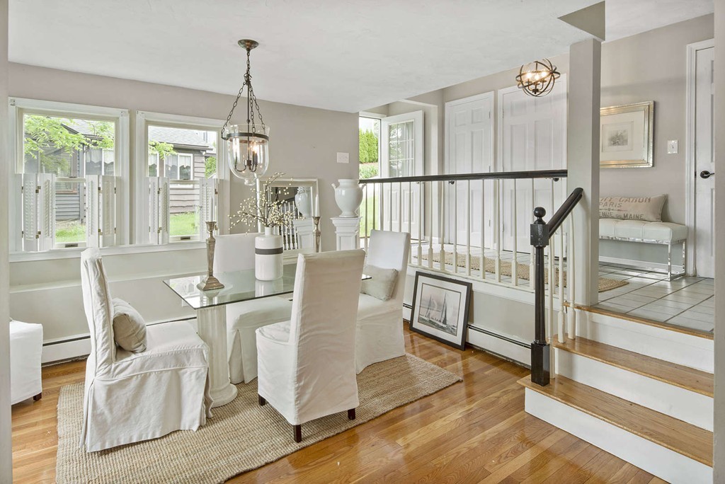 23 Crabtree Road Quincy, MA 02171 - Photo 8 of 20 a dining room with wooden floor table and chairs
